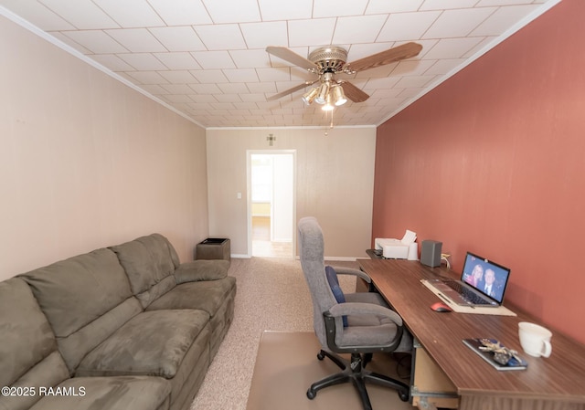 office area featuring ornamental molding, carpet, and a ceiling fan
