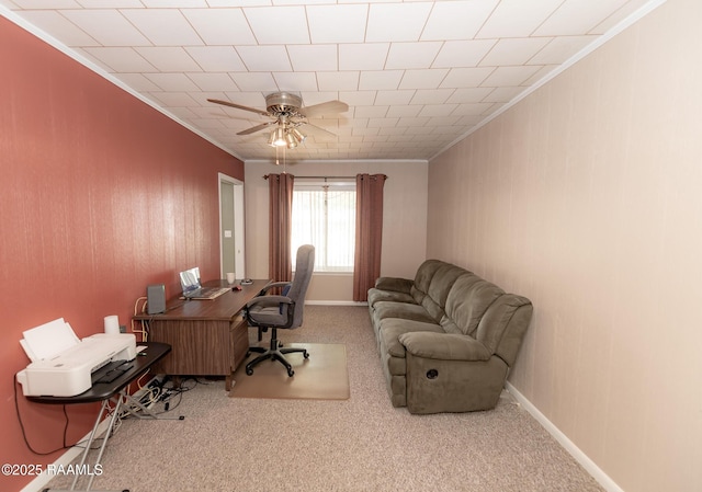 office area featuring crown molding, a ceiling fan, and carpet floors