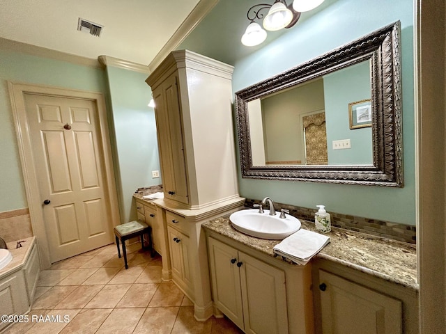 10427 U S Highway 167, Abbeville, LA 70510 - bathroom featuring a garden tub, visible vents, crown molding, tile patterned flooring, and vanity