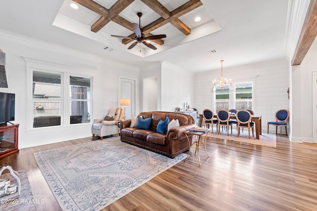 living room featuring beam ceiling, wood finished floors, ceiling fan with notable chandelier, coffered ceiling, and recessed lighting