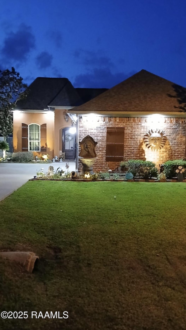 107 Octavia Dr, Scott, LA 70583 - view of front facade featuring a yard