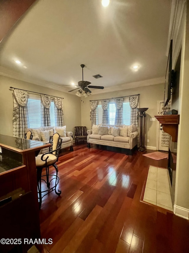 107 Octavia Dr, Scott, LA 70583 - living room with crown molding, ceiling fan, hardwood / wood-style flooring, recessed lighting, and baseboards