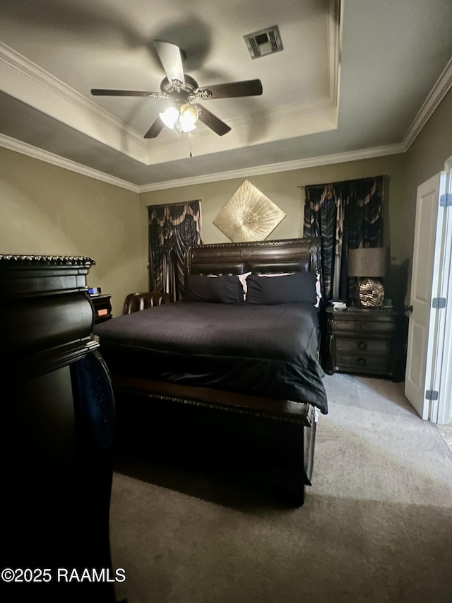 107 Octavia Dr, Scott, LA 70583 - bedroom with a raised ceiling, carpet floors, ornamental molding, and ceiling fan