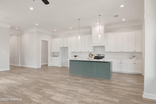 kitchen featuring white cabinets, light wood-style flooring, electric range, and decorative backsplash