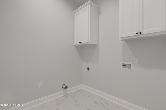 laundry area featuring cabinet space, washer hookup, electric dryer hookup, marble finish floor, and baseboards