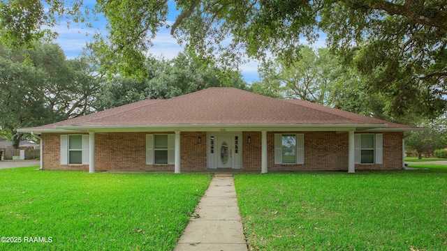 1621 Elm St, New Iberia, LA 70560 - single story home with brick siding, a shingled roof, and a front lawn