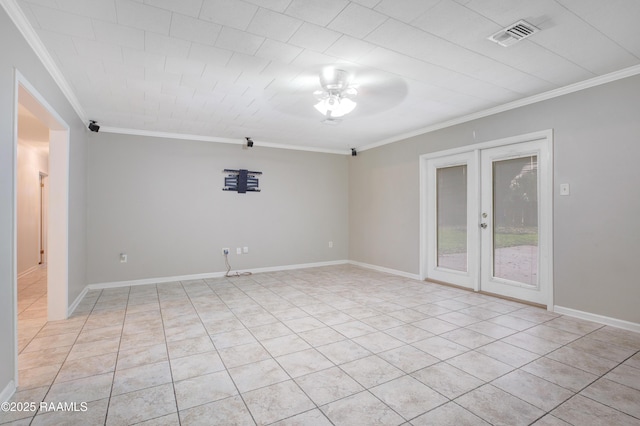 1621 Elm St, New Iberia, LA 70560 - spare room with crown molding, ceiling fan, light tile patterned floors, and french doors