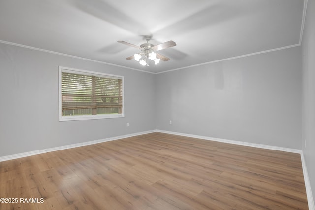 1621 Elm St, New Iberia, LA 70560 - unfurnished room with crown molding, a ceiling fan, baseboards, and light wood-type flooring