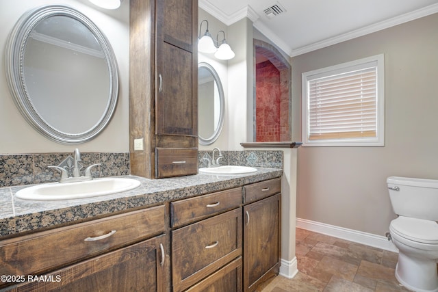 1621 Elm St, New Iberia, LA 70560 - full bathroom featuring stone finish flooring, toilet, visible vents, and a sink