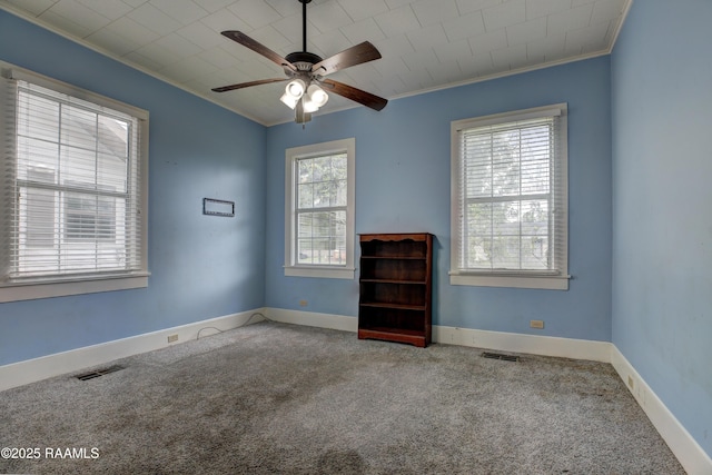 627 Weeks St, New Iberia, LA 70560 - spare room featuring carpet, ceiling fan, ornamental molding, and baseboards