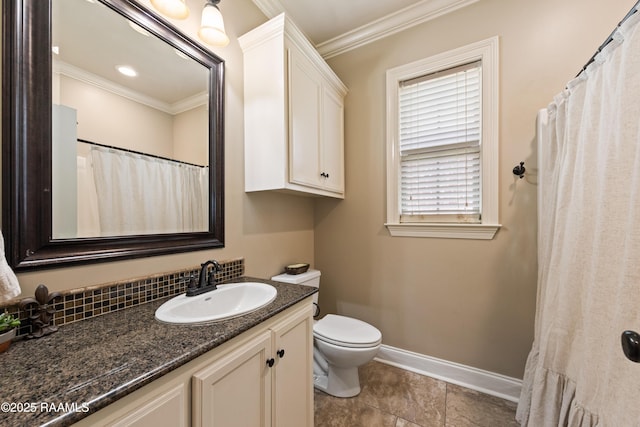 full bath featuring crown molding, baseboards, toilet, and vanity