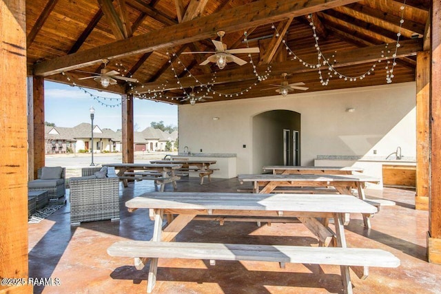 view of patio / terrace with a ceiling fan