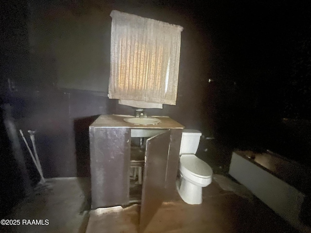 bathroom with a sink and toilet