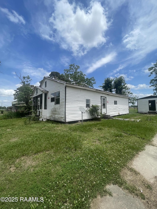 exterior space with a lawn