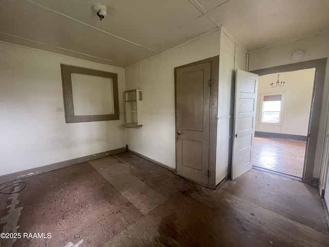 empty room with baseboards