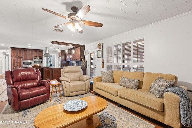 492 Kent St, Breaux Bridge, LA 70517 - living area featuring ceiling fan, ornamental molding, and recessed lighting