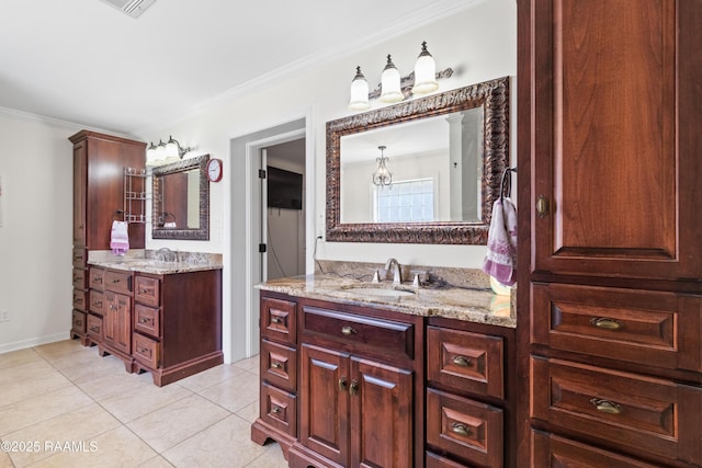 492 Kent St, Breaux Bridge, LA 70517 - full bathroom featuring ornamental molding, tile patterned flooring, two vanities, and baseboards
