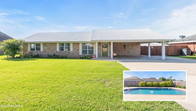 492 Kent St, Breaux Bridge, LA 70517 - view of front of house featuring cooling unit, metal roof, concrete driveway, and brick siding