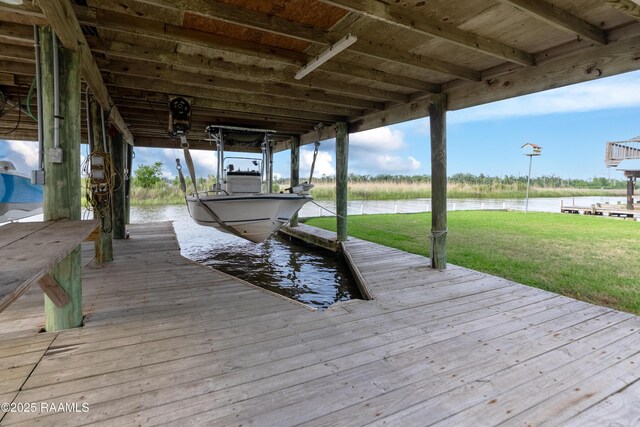 4998 Airhart Rd Unit A, Lake Charles, LA 70605 - dock area with a lawn, boat lift, and a water view