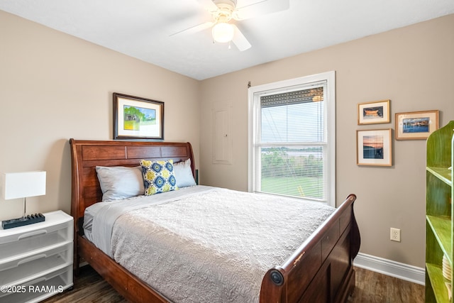4998 Airhart Rd Unit A, Lake Charles, LA 70605 - bedroom featuring a ceiling fan, baseboards, and dark wood-type flooring