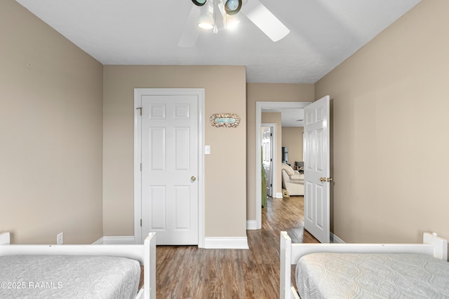 4998 Airhart Rd Unit A, Lake Charles, LA 70605 - bedroom with baseboards, ceiling fan, and wood finished floors