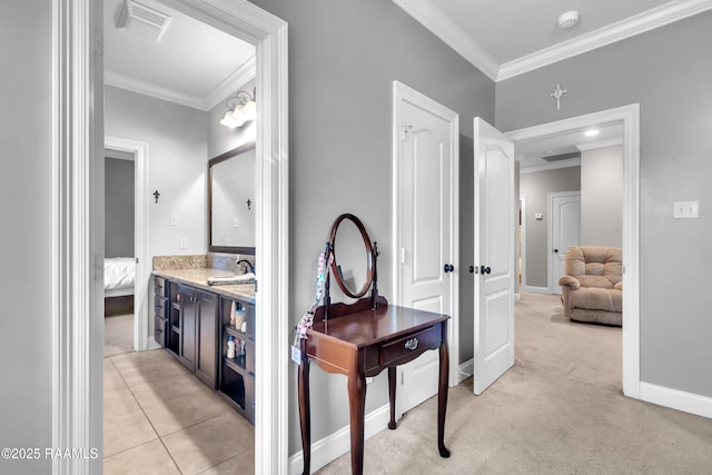 bathroom featuring crown molding, visible vents, ensuite bathroom, and vanity