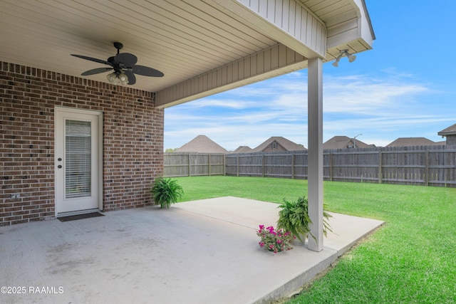 view of patio featuring ceiling fan and a fenced backyard