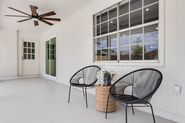 view of patio / terrace featuring ceiling fan