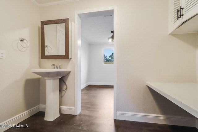 109 W Roosevelt St, Broussard, LA 70518 - interior space featuring crown molding, dark wood finished floors, and baseboards