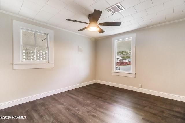 109 W Roosevelt St, Broussard, LA 70518 - spare room with crown molding, a ceiling fan, dark wood finished floors, and baseboards