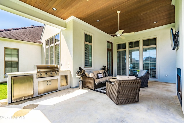 104 Peaceful Hollow Ln, Lafayette, LA 70508 - view of patio with area for grilling, a ceiling fan, a sink, an outdoor hangout area, and an outdoor kitchen