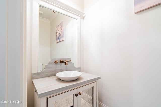 104 Peaceful Hollow Ln, Lafayette, LA 70508 - bathroom featuring vanity and ornamental molding