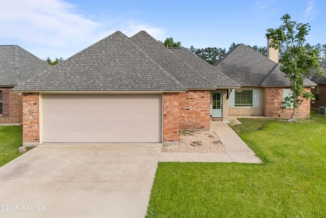 1115 Jules Broussard Rd, Breaux Bridge, LA 70517 - single story home with driveway, a shingled roof, and a garage