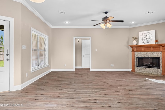 1115 Jules Broussard Rd, Breaux Bridge, LA 70517 - unfurnished living room featuring visible vents, ornamental molding, and wood finished floors
