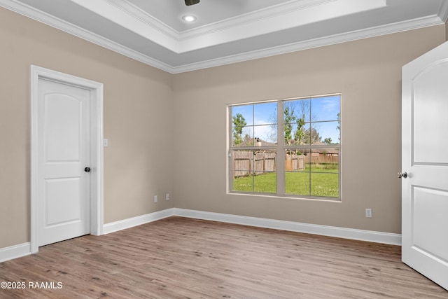 1115 Jules Broussard Rd, Breaux Bridge, LA 70517 - unfurnished room featuring light wood finished floors, recessed lighting, baseboards, a tray ceiling, and ornamental molding