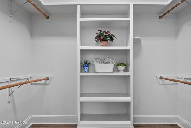 1115 Jules Broussard Rd, Breaux Bridge, LA 70517 - spacious closet featuring wood finished floors