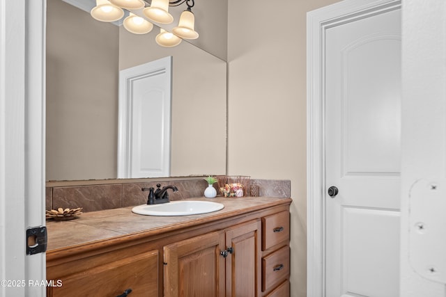1115 Jules Broussard Rd, Breaux Bridge, LA 70517 - bathroom with a notable chandelier and vanity