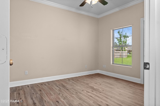 1115 Jules Broussard Rd, Breaux Bridge, LA 70517 - empty room featuring plenty of natural light, ceiling fan, wood finished floors, baseboards, and ornamental molding