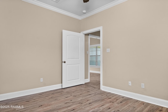 1115 Jules Broussard Rd, Breaux Bridge, LA 70517 - empty room featuring ceiling fan, baseboards, ornamental molding, and light wood-style flooring