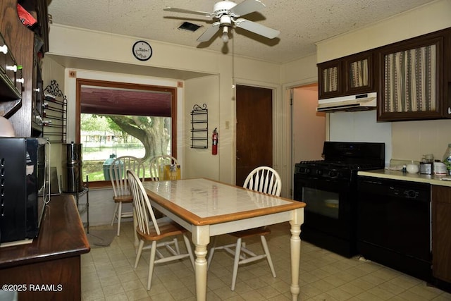 118 Fraternity Dr, Lafayette, LA 70506 - dining area featuring a textured ceiling and ceiling fan
