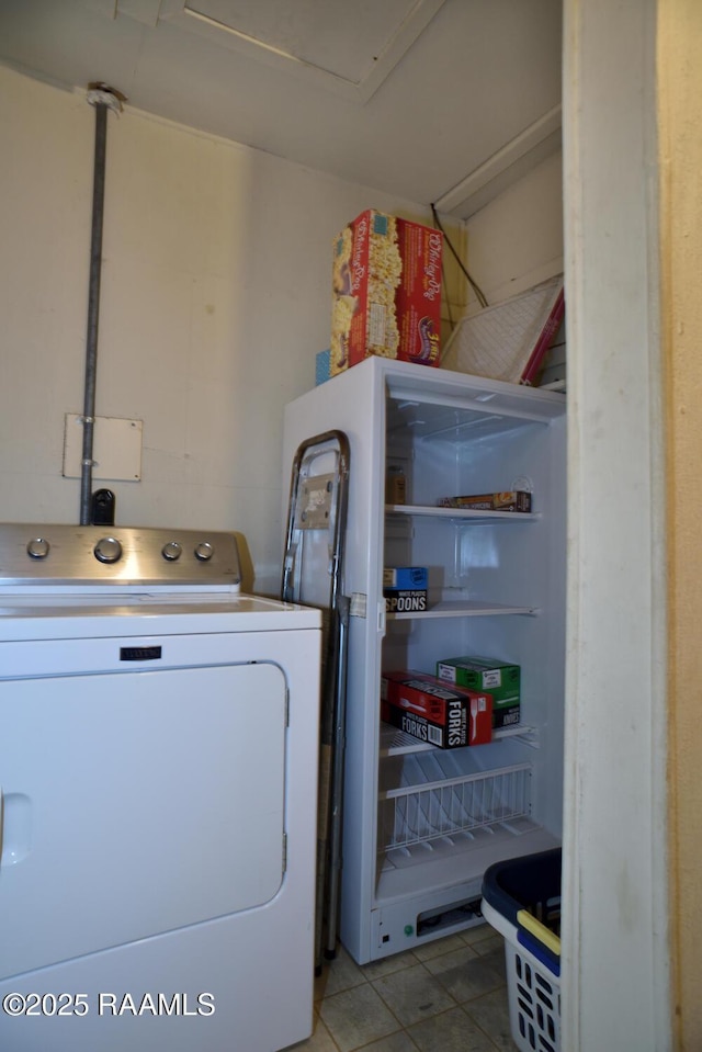 118 Fraternity Dr, Lafayette, LA 70506 - washroom featuring washer / dryer, light tile patterned floors, and laundry area