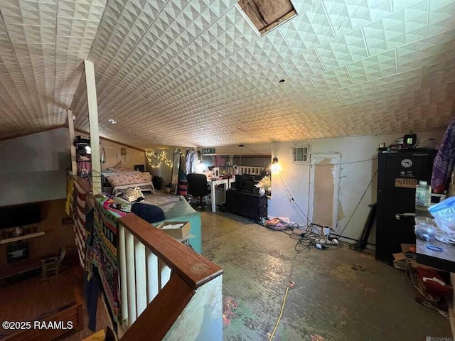 interior space with concrete flooring and lofted ceiling