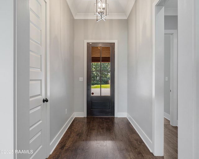 147 Heathwood Dr, Broussard, LA 70518 - entryway with a chandelier, baseboards, dark wood-type flooring, and ornamental molding