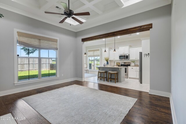 147 Heathwood Dr, Broussard, LA 70518 - living area featuring beamed ceiling, coffered ceiling, baseboards, recessed lighting, and wood-type flooring