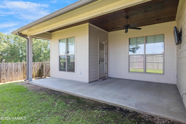 147 Heathwood Dr, Broussard, LA 70518 - property entrance featuring a ceiling fan, a patio, and fence