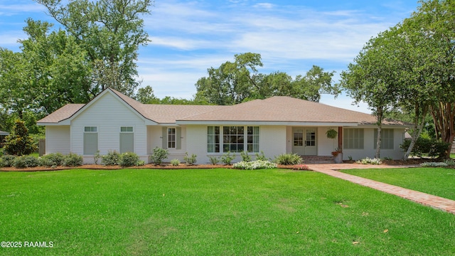 1022 Roselawn Dr, Lafayette, LA 70503 - ranch-style house with brick siding, a front lawn, and roof with shingles