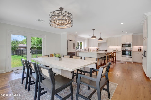 1022 Roselawn Dr, Lafayette, LA 70503 - dining room with recessed lighting, visible vents, and plenty of natural light