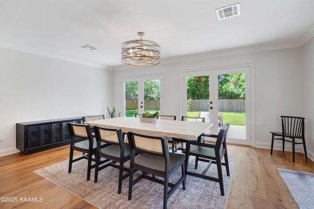 1022 Roselawn Dr, Lafayette, LA 70503 - dining area with visible vents, a wealth of natural light, and french doors