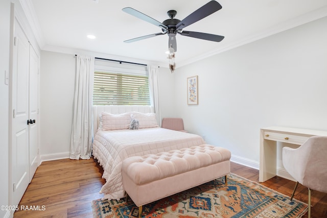 1022 Roselawn Dr, Lafayette, LA 70503 - bedroom with crown molding, baseboards, and wood finished floors