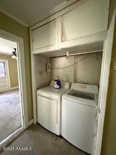 washroom with laundry area, ornamental molding, washing machine and dryer, and carpet flooring